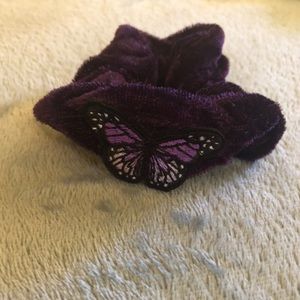 Really dark purple with a butterfly